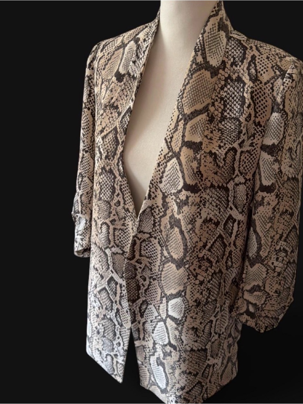 Women’s Blazer by The Limited. Beige/Black snake print, open front, size small.